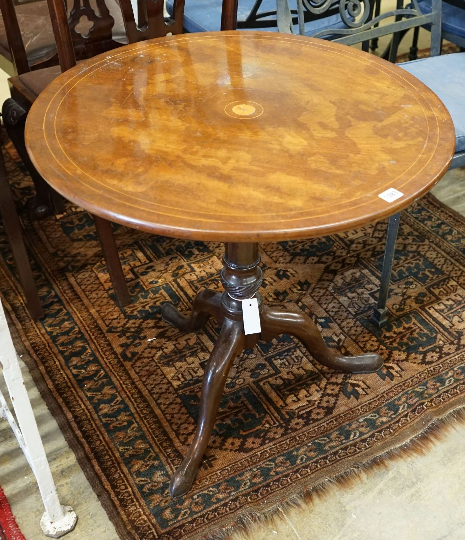 A George III inlaid mahogany circular tilt top tea table, diameter 72cm, height 69cm